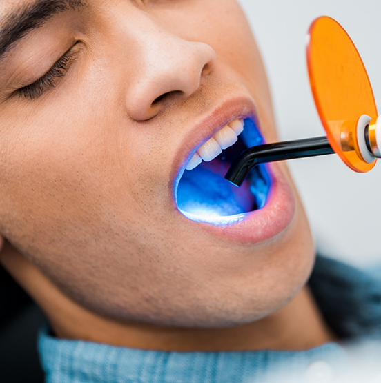 Dental patient receiving direct bonding