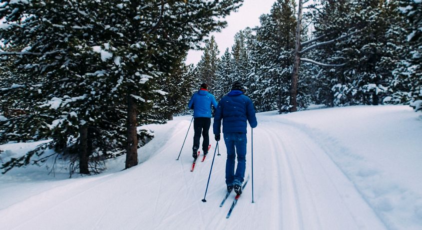 Two people skiing